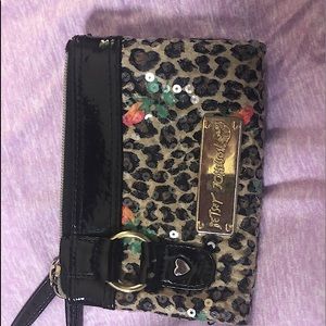 Betsy Johnson leopard and sequin wristlet